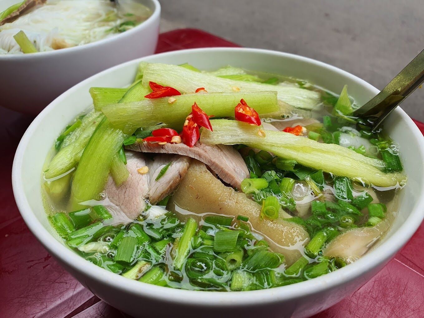 Capture the savory essence of Hanoi’s street food gem